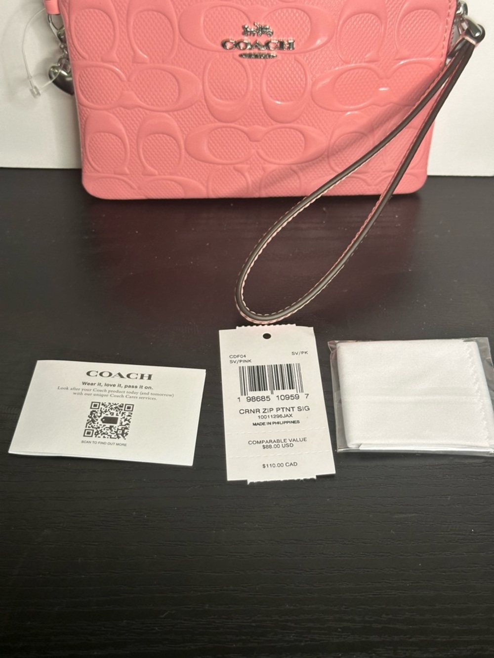 Corner Pink Patent Zip Embossed Wristlet In Signature Leather With Heart Charm - Picture 8 of 9